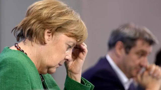 Almanya Başbakanı Merkel 11 saatlik toplantıdan çıkıp böyle duyurdu: Yenemedik, peşimizi bırakmıyor