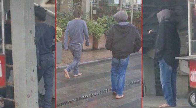 Dilenci çocukların çıplak ayak oyunu kamerada