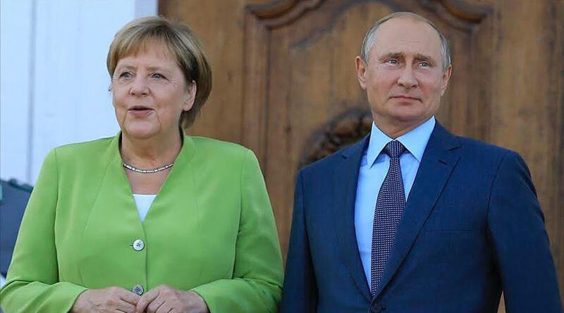 Son dakika... Putin ve Merkel Ukrayna'daki krizi görüştü