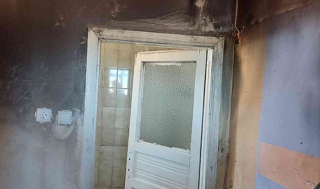Evi yanan aileye yardım eli