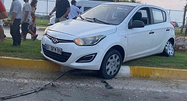 Çim kesen belediye çalışanlarına otomobil çarptı:2 yaralı
