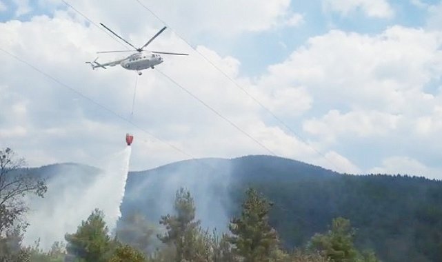 Tavşanlı'da orman yangını helikopter desteği ile kısa sürede söndürüldü