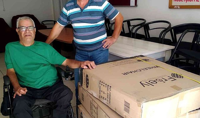 Mavi kapaklar tekerlekli sandalyeye dönüştü