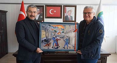 Cabar katliamını anlatan eserini Başkan Vural'a takdim etti