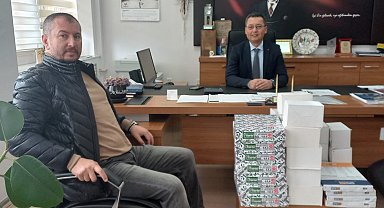 Ezine OSB Müdürü Altınok'tan ilkokula kırtasiye yardımı