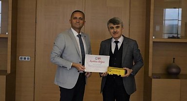 Rektör Uysal'dan Armağan'a teşekkür belgesi