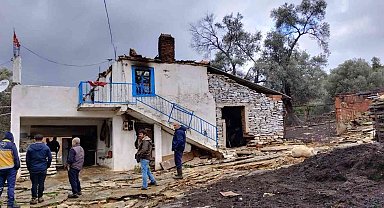 Soba kovasından çıkan yangında ev zarar gördü